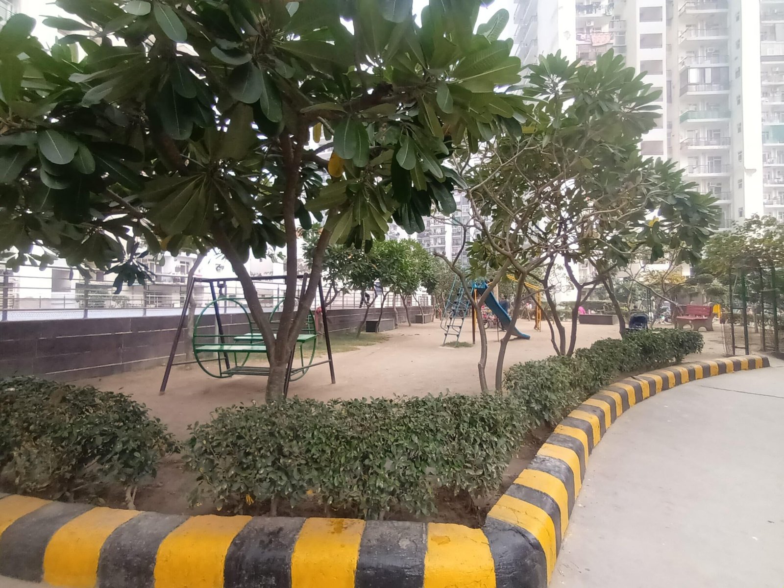 Gardenia Glory Sector 46 Noida towers viewed from the central landscaped garden